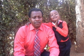 Pastor Sammy and son.
