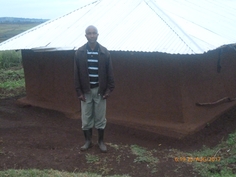 Pastor Philip Sire at Transmara Evangelical Church, August, 2017