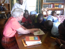 Sue Gravino reading with Grace Childrens Home kids, 2011